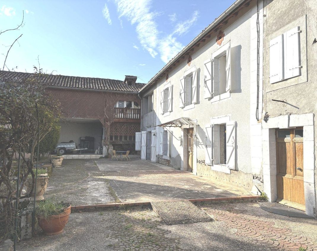 Image Façade à  maison individuelle de Villeneuve-de-Rivière