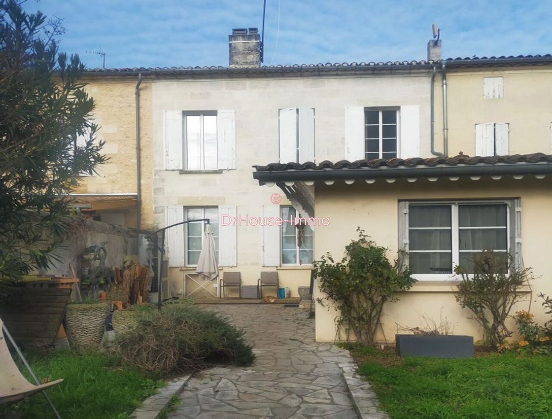 Image Façade à  maison jumelée de Guîtres