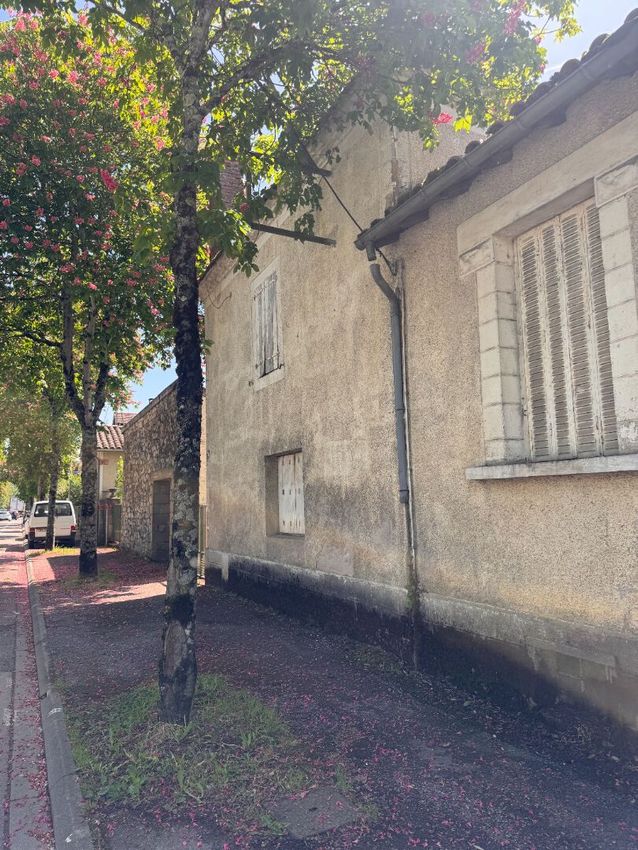 Image Façade à  maison mitoyenne de Figeac