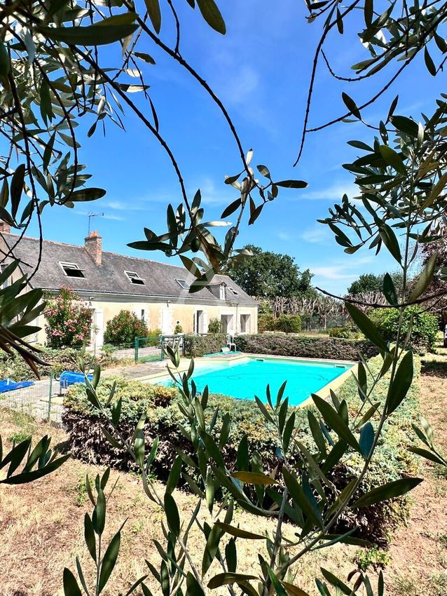Image Piscine à  maison individuelle de Soulaire-et-Bourg