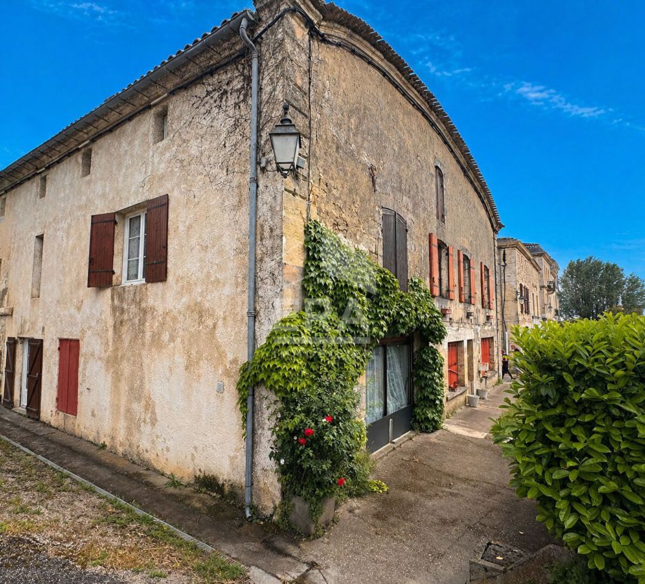 Image Façade à  maison mitoyenne de Bourg