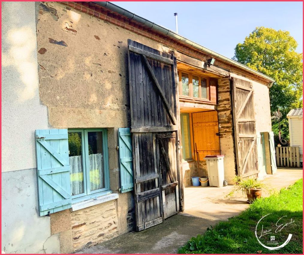 Image Façade à  maison individuelle de Sazeray