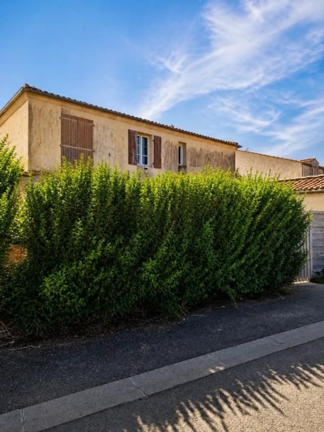 Image Façade à  maison individuelle de Courçon