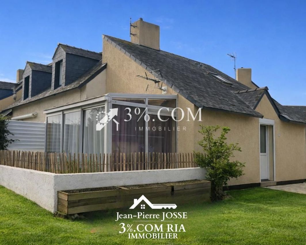 Image Façade à  maison de village de Étel