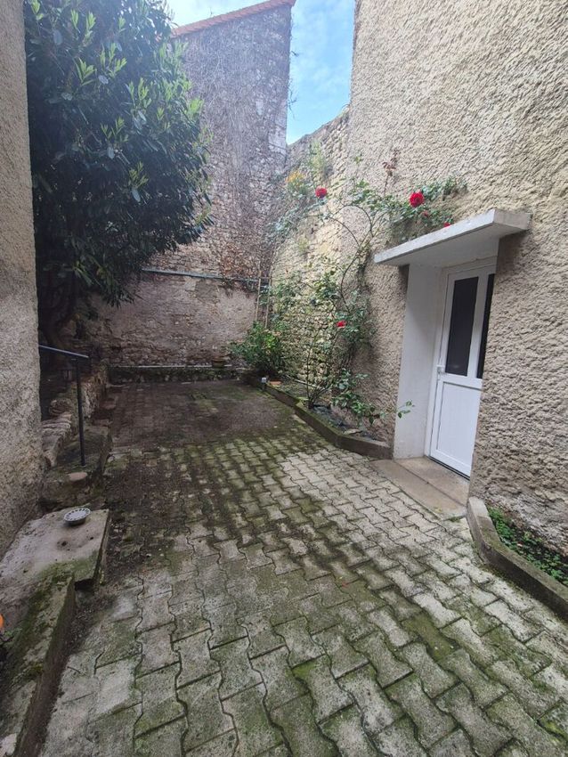 Image Façade à  maison mitoyenne de Ébreuil