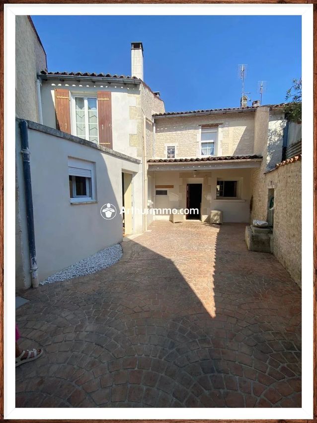 Image Façade à  maison individuelle de Matha