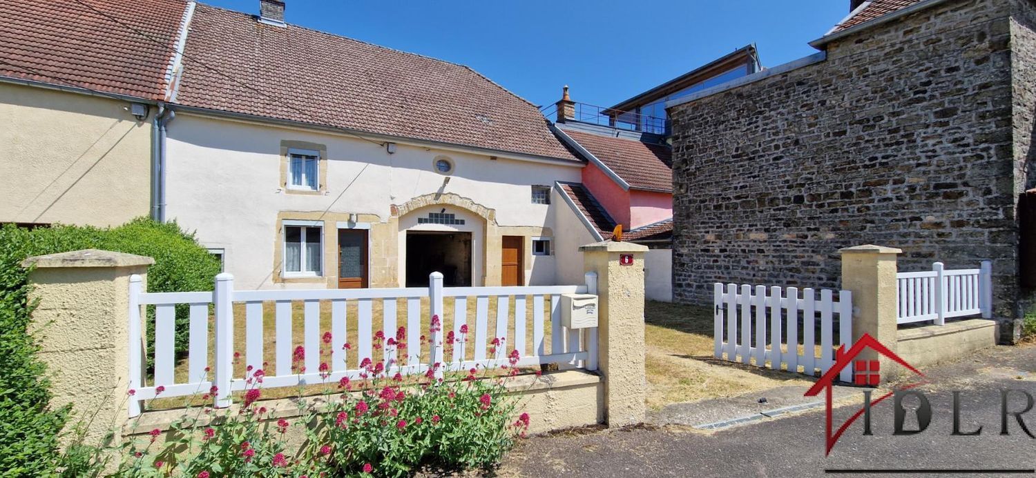 Image Façade à  maison de village de Preigney