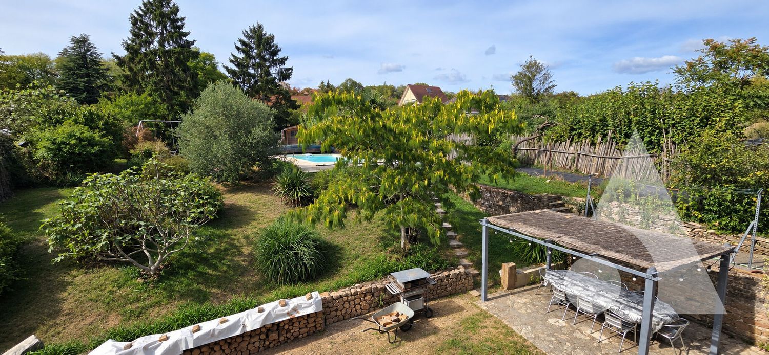 Image Jardin à  maison individuelle de Rainans