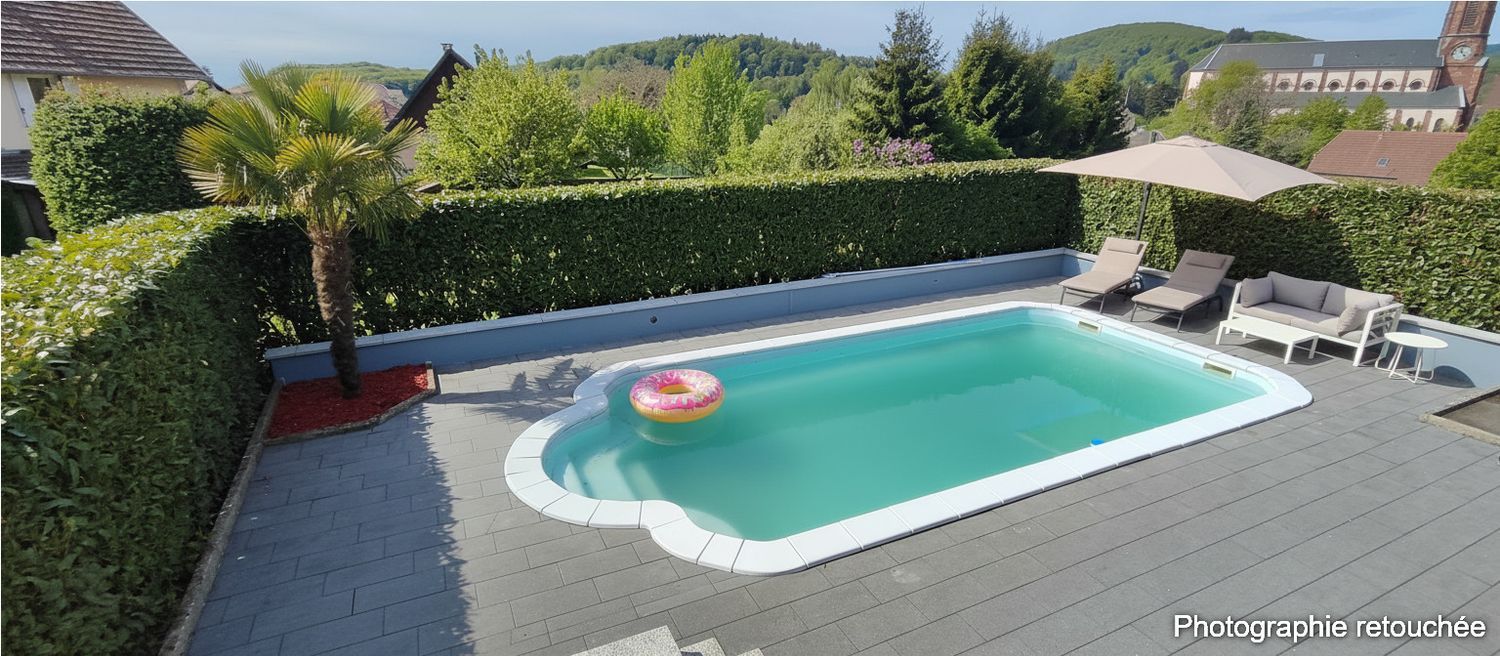 Image Piscine à  maison individuelle de Rougemont-le-Château